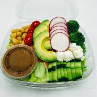 Veggie Chopped Salad · Romaine, avocado, grape tomato, cucumber, chick peas, radish, broccoli, carrots, feta, and h...