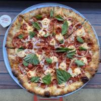 Diavolo- · red, mozzarella, spicy pepperoni, shaved raw onion, Calabrian whipped ricotta, more Calabria...