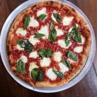 Margherita Pie- · red, fresh mozzarella, fresh basil, parmigiano, finished with olive oil