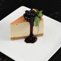 Cheesecake · Toasted vanilla crumb crust, choice of fresh strawberries or blueberries