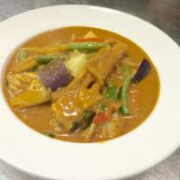 35. Pa-Naeng-Nur · Thai style beef curry in coconut milk and red chili with a touch of sweet basil.