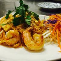 60. Pad Thai  · Pan fried rice noodles with shrimp, tofu, egg and bean sprouts.