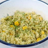 Cilantro Rice · Cooked in a cilantro base mixed with whole corn.
