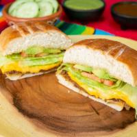 Torta Combo · Choice of meat, Cheese, rice, beans, tomato, lettuce on bread , and one Drink