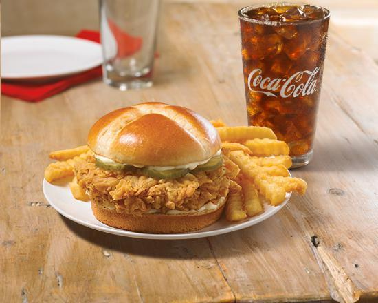 Spicy Chicken Sandwich Combo · We placed over 65 years of delicious into this sandwich. Taste our legendary hand-battered chicken, topped with a signature honey-butter brushed brioche bun with mayo and pickles. Served with regular side and large drink.