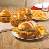 Feed 4 Chicken Sandwich Combo · We crafted a sandwich using our legendary hand-battered chicken fillet placed between a hone...