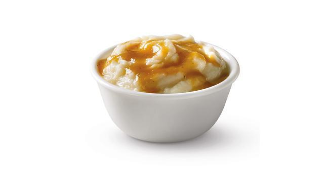 Mashed Potatoes · Before you get to the potatoes, let’s talk about our savory, rich gravy. OK, now that we’ve done that, imagine it over a hefty helping of delicious mashed potatoes. Now add to order. You're welcome.