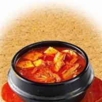 Kimchi Soup · Spicy Kimchi soup with pork and Tofu, serve with rice.