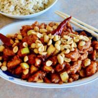 201. Kang Pao Chicken Combo · Hot. Diced chicken sauteed with red chili peppers, celery and water chestnuts in a spicy sau...