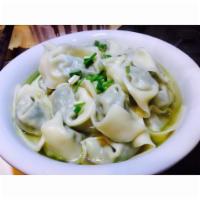 Shanghai Vegetable with Pork Wonton Soup（荠菜大馄饨） · Seasend broth with filled wonton dumplings.