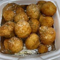 Fried Mushrooms · Generous helping of breaded and fried mushrooms garnished with Italian herbs and served with...