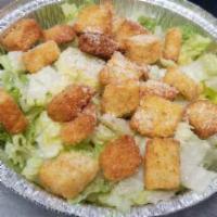 Traditional Caesar Salad · Romaine, croutons and Parmesan cheese.