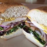 Classic Chicken Sandwich · Tender chicken breast, lettuce, tomato, red onion, mustard and mayo.