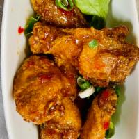 Mountain Chicken Wings · 5 pieces. Chicken wings with spicy tamarind sauce.