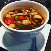 Tom Yum Goong Soup · Sour. Spicy and sour soup with shrimp, mushroom and lemongrass. Spicy.