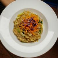 Street Noodle · Stir-fried wide noodles sauteed with brown sauce, bean sprout, egg, Thai cabbage pickles, Th...