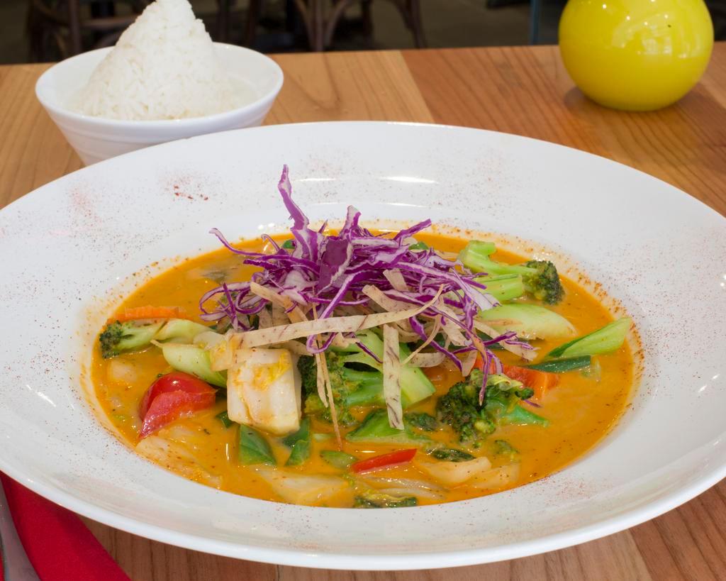 Panang Curry · Special curry paste with Thai herbs in coconut milk. Spicy.