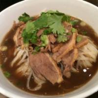 Duck Noodle Soup · Braised duck, bean sprout, scallion and clear broth with rice vermicelli.