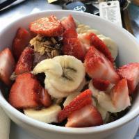 Granola Breakfast · Served with Greek yogurt, seasonal fruits and milk.