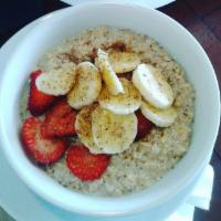 Oatmeal Breakfast · Served with strawberries, bananas, flax seeds, brown sugar and steamed milk.