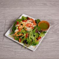 House Salad · Mixed greens with diced tomato, cucumber, red onion, shaved Parmesan, toasted almonds and ca...