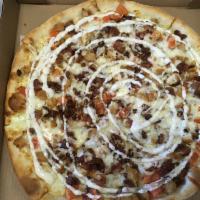 Chicken, Bacon & Ranch Pizza · Crispy chicken and bacon topped with ranch swirls.