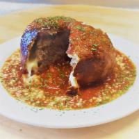 Meatball Bombs · Large house-made meatballs, wrapped in pizza dough, filled with mozzarella cheese, and then ...