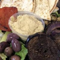 Hummus Dip with Pita & Veggies App · House-made hummus dip. Served with pita wedges and fresh and grilled vegetables.