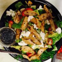 Chicken, Avocado and Berry Salad · Fresh spring greens topped with grilled chicken breast, sliced avocado, seasonal berries, go...