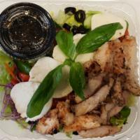 Chicken Caprese Salad · House salad mix topped with marinated grilled chicken breast, tomatoes, olives, roasted red ...