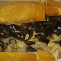 French Dip Roast Beef Sandwich · Thinly sliced roast beef, cooked in house-made gravy, served on a toasted roll, with balsami...