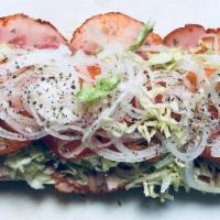 Italian Hoagie · Made with provolone cheese, lettuce, tomatoes, onions, salt, pepper, oregano and oil.