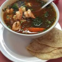 Caldo de Camarón · Shrimp soup with vegetables comes with homemade flour or corn tortillas. Caldo de cameron co...