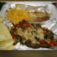 Carne Asada Estilo Jalisco · Thin grilled steak topped with mushrooms, bell pepper, onions and melted cheese with a side ...