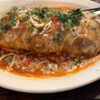 Burrito Supreme  · Burrito supreme meat options asada, shredded chicken, al pastor 
Toppings include onions, ci...