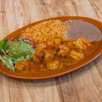Camarones Rancheros · Shrimp sauteed with onions, tomatoes, and salsa. Spicy.