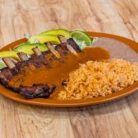 Costillas  · Ribs. Baby back ribs with your choice of spicy barbecue or tomatillo sauce.