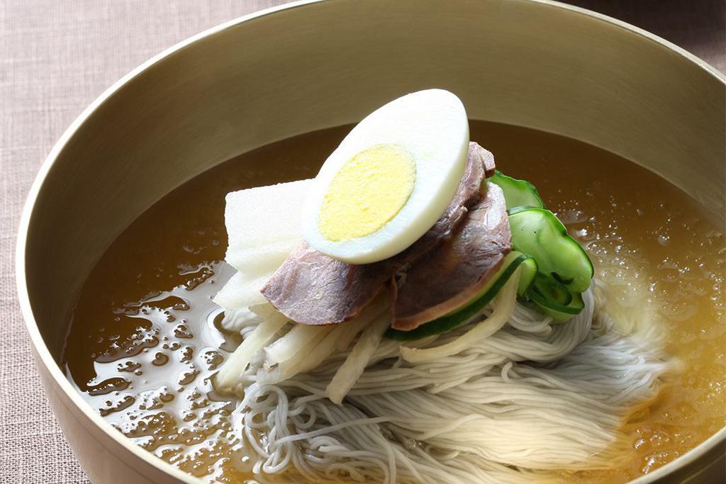 Chik Mul Nyangmyun · Arrowroot noodles in the chilled broth.