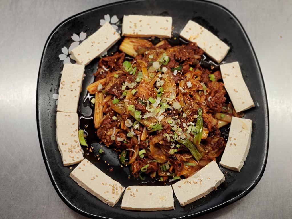 Jeyuk Dubu Kimchi · Stir fried pork, kimchi, and tofu.