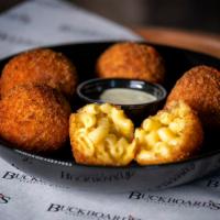 Mac and Cheese Balls · Five Deep Fried Balls of our Famous Mac and Cheese with Pasilla Pepper Dip.