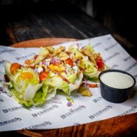Wedge Salad · Quarter Head of Iceberg Lettuce with Diced Red Onion, Sliced Grape Tomato, Thick Cut Bacon, ...