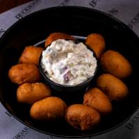 Mini Corn Mutts · Ten Deep Fried Miniature Corn Dogs with a Choice of Side.