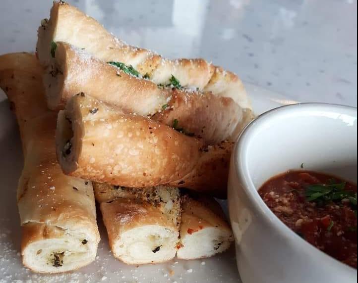 Bread Stix · Twisted dough, with our special blend of herbs and spices, baked and served with a side of marinara.