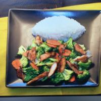 Broccoli Chicken · Stir fried tender chicken and fresh broccoli in a ginger soy sauce. Served with rice.