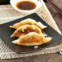 8 Pieces Gyoza · Japanese dumplings.