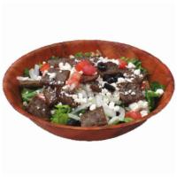 Greek Salad · Crisp romaine lettuce tossed with onions, cucumbers, fresh tomatoes, olives, feta cheese and...