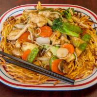 N7. Double Pan Fried Noodles · A delicious, crispy, fried egg noodled topped with choice of meat, mixed veggies, & rich bro...