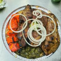 Lamb Chops and Chicken Tikka · 3 pieces flame-grilled lamb chops and one skewer of chicken tikka served with rice, salad, s...