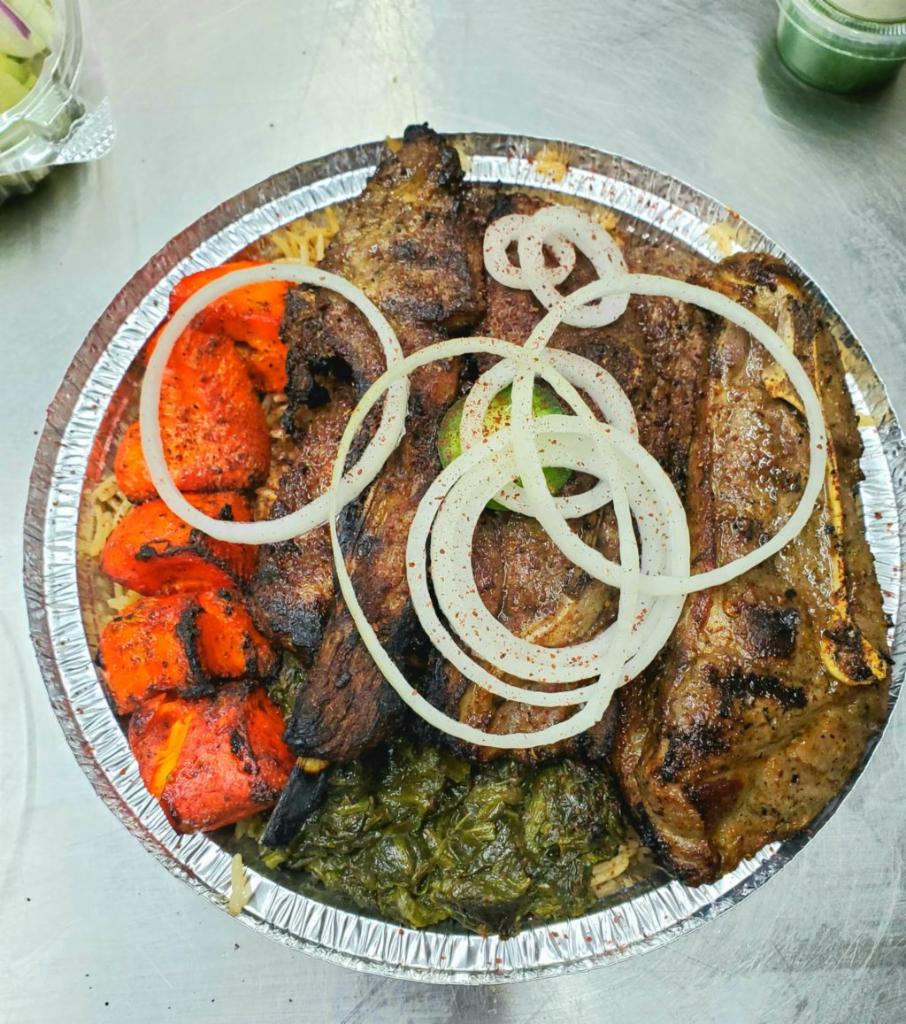 Lamb Chops and Chicken Tikka · 3 pieces flame-grilled lamb chops and one skewer of chicken tikka served with rice, salad, spinach, tandoori bread, white sauce, and red chutney. Add sides for an additional charge.