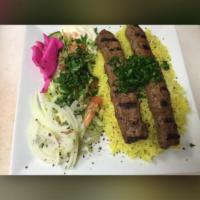 Kefta Kabob Platter · Ground beef patty with parsley, onion and tomato on a bed of rice. No veggies.